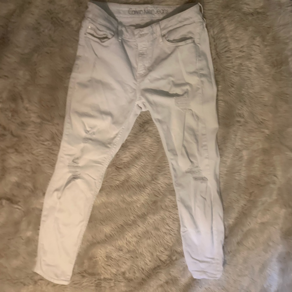 White ripped jeans